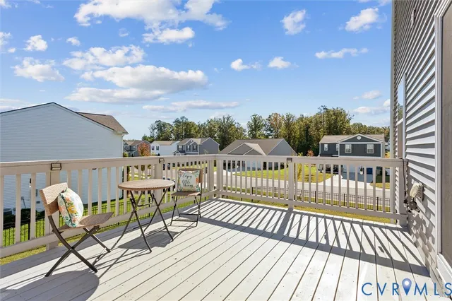 a view of a chairs on wooden deck