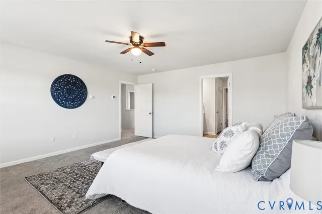 a bathroom with a double vanity sink mirror and shower