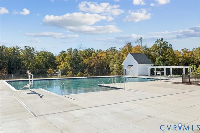 a view of a park with swings and slides