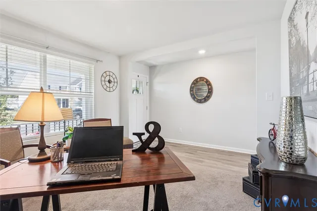 a workspace with furniture and lamp