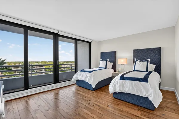 a bathroom with a sink a mirror and a shower