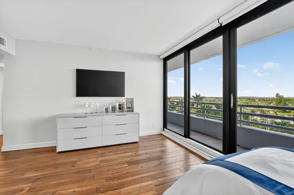 a bathroom with a sink vanity and mirror