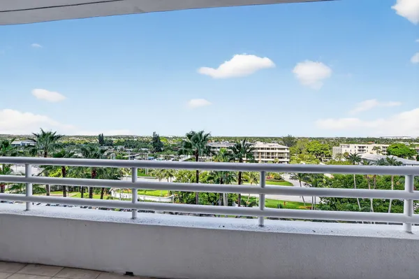 a view of a house with a fountain and a fountain