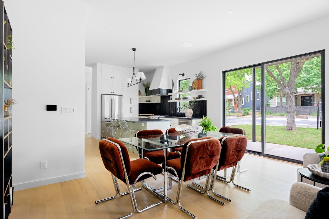 4911 Duval Street Austin, TX 78751 - Photo 14 of 40 a view of a dining room with furniture window and outside view
