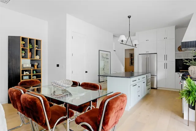 a view of a dining room with furniture