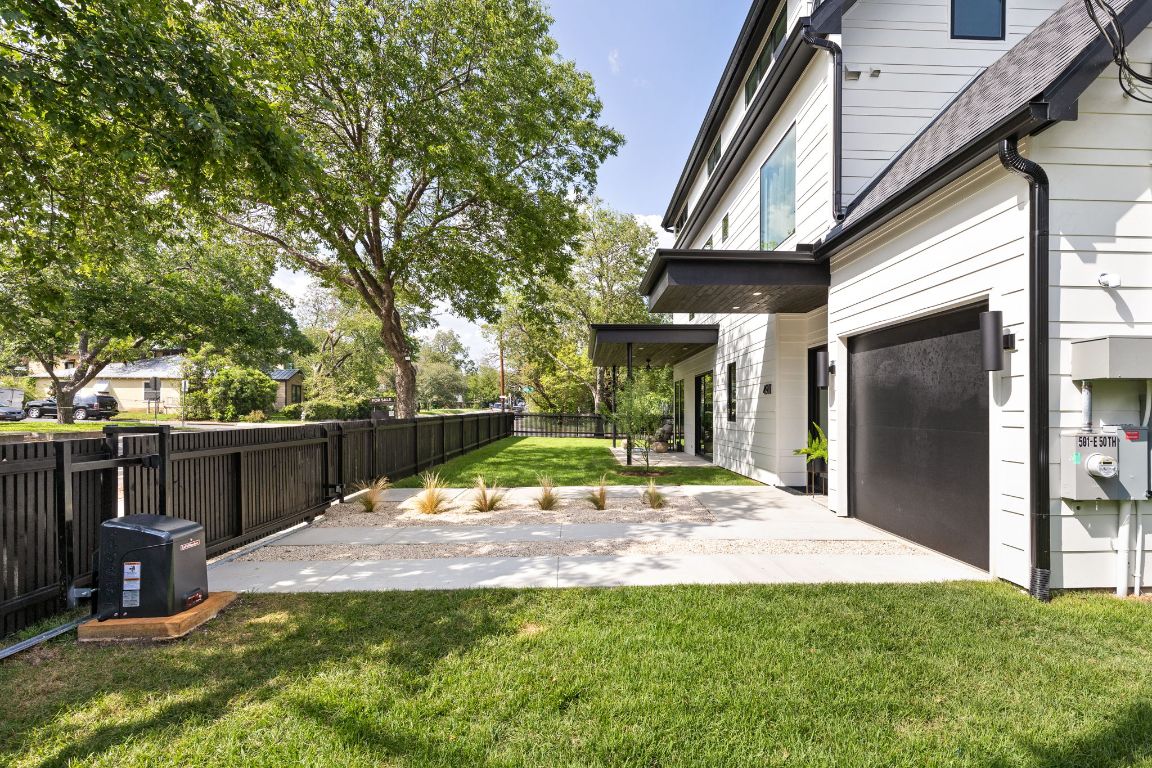 4911 Duval Street Austin, TX 78751 - Photo 32 of 40 Fenced backyard featuring a patio