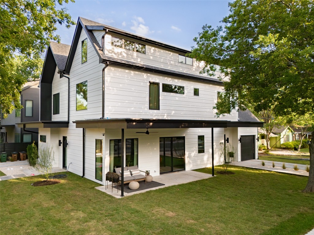 4911 Duval Street Austin, TX 78751 - Photo 34 of 40 a front view of a house with a garden and porch