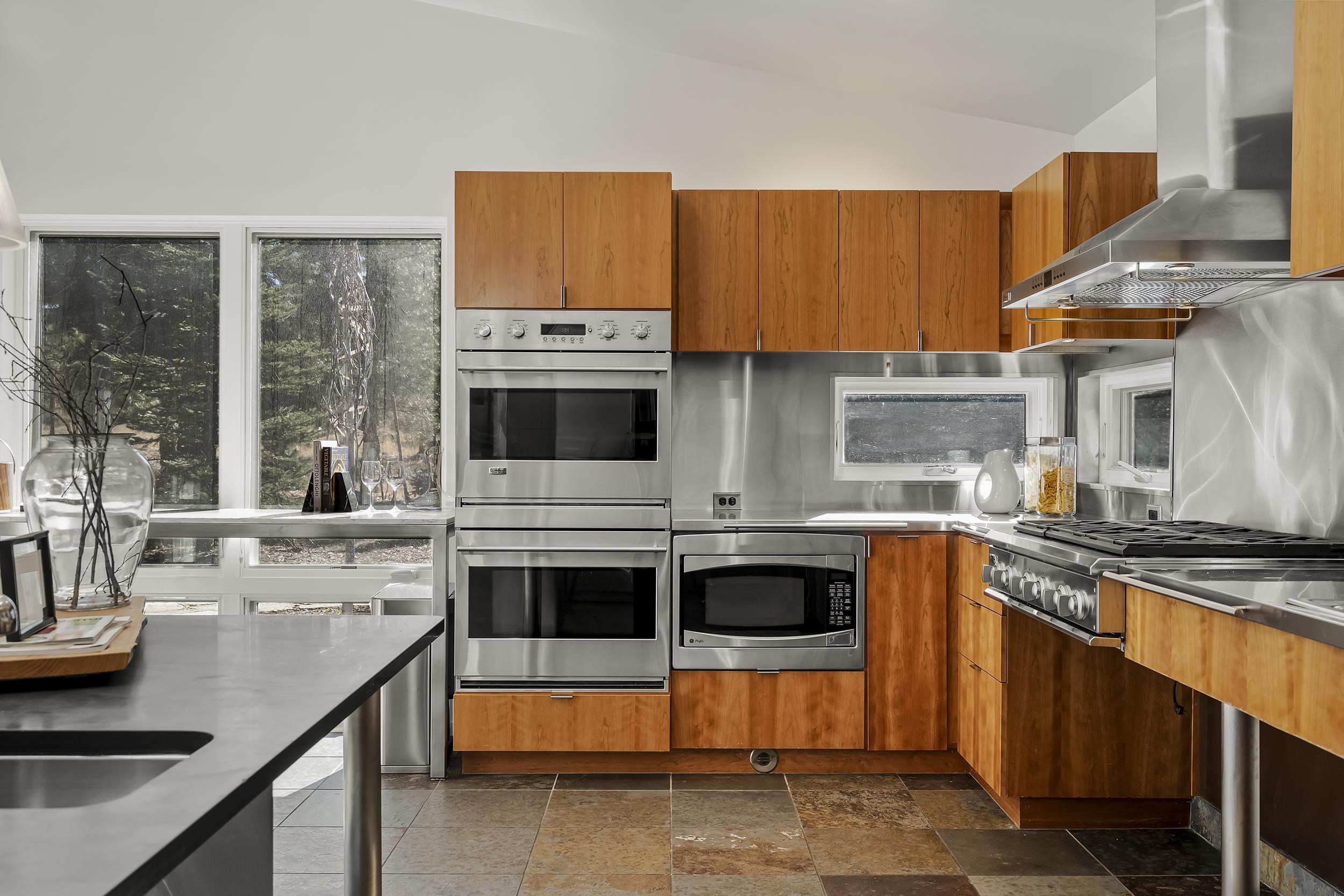 11906 Stallion Way Truckee, CA 96161 - Photo 11 of 20 a kitchen with stainless steel appliances granite countertop a stove and a sink