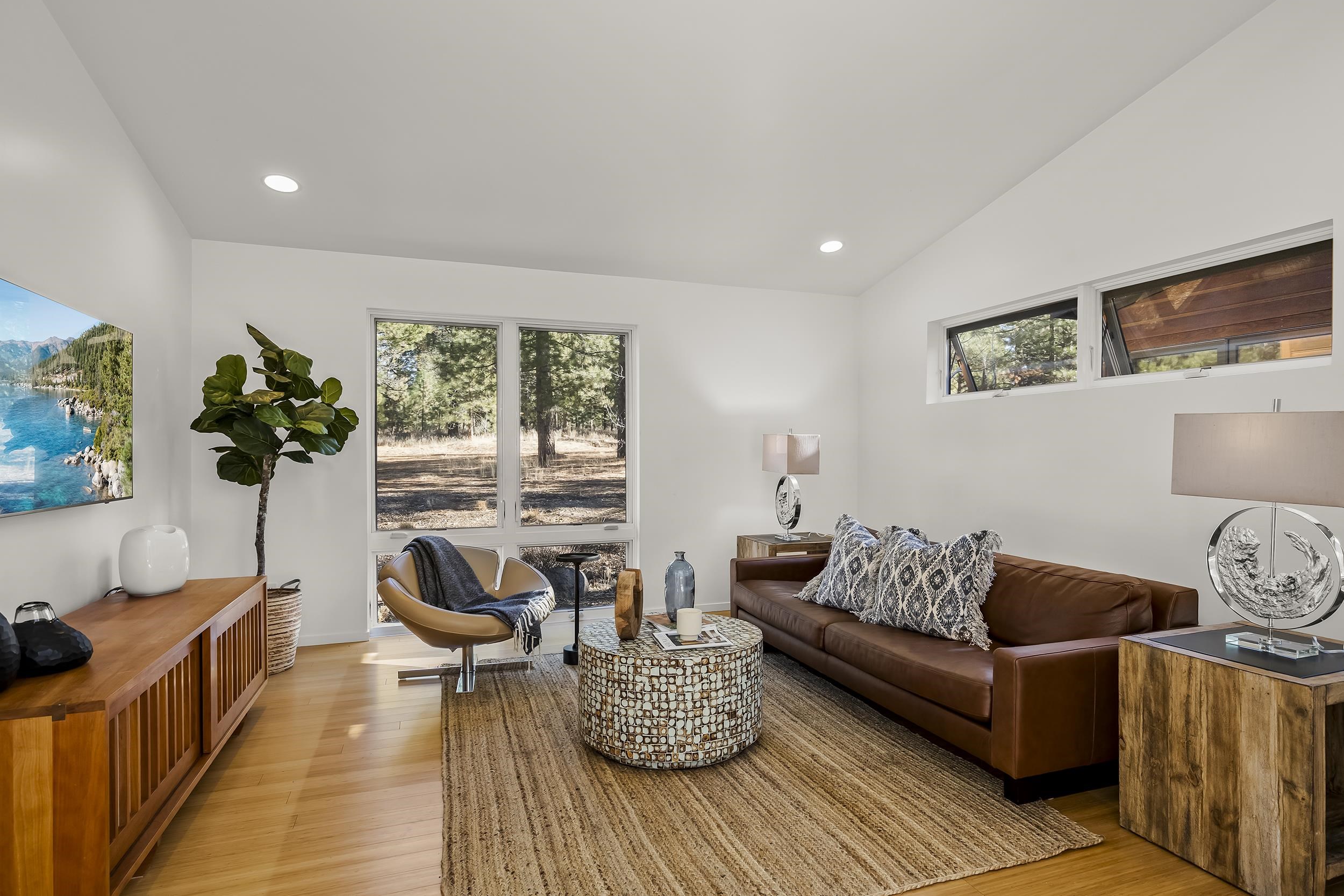 11906 Stallion Way Truckee, CA 96161 - Photo 12 of 20 a living room with furniture and a large window