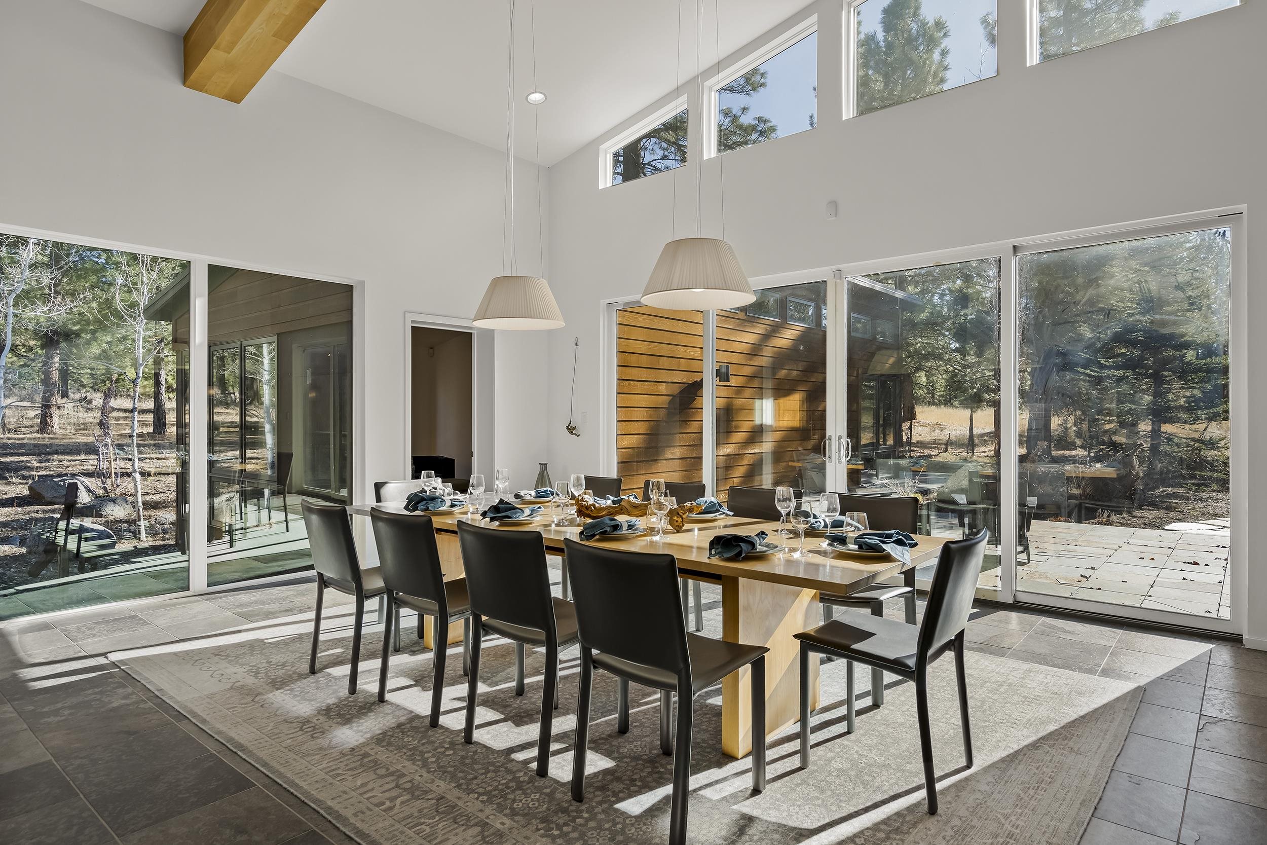 11906 Stallion Way Truckee, CA 96161 - Photo 7 of 20 a view of a dining room with furniture window and outside view