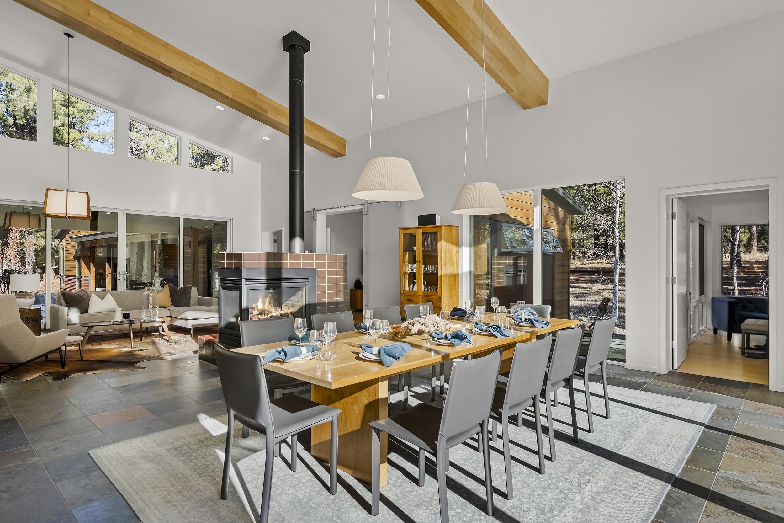 11906 Stallion Way Truckee, CA 96161 - Photo 8 of 20 a view of a dining room with furniture one side kitchen view and wooden floor