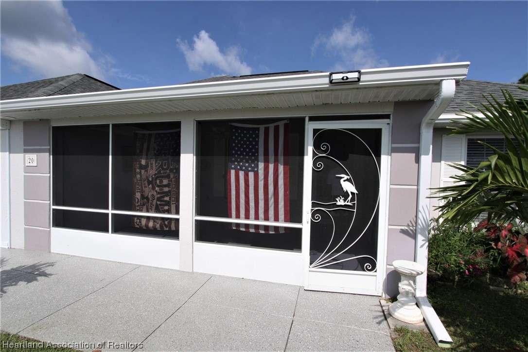 20 Quail Roost Road Lake Placid, FL 33852 - Photo 13 of 28 a view of a entryway door of the building
