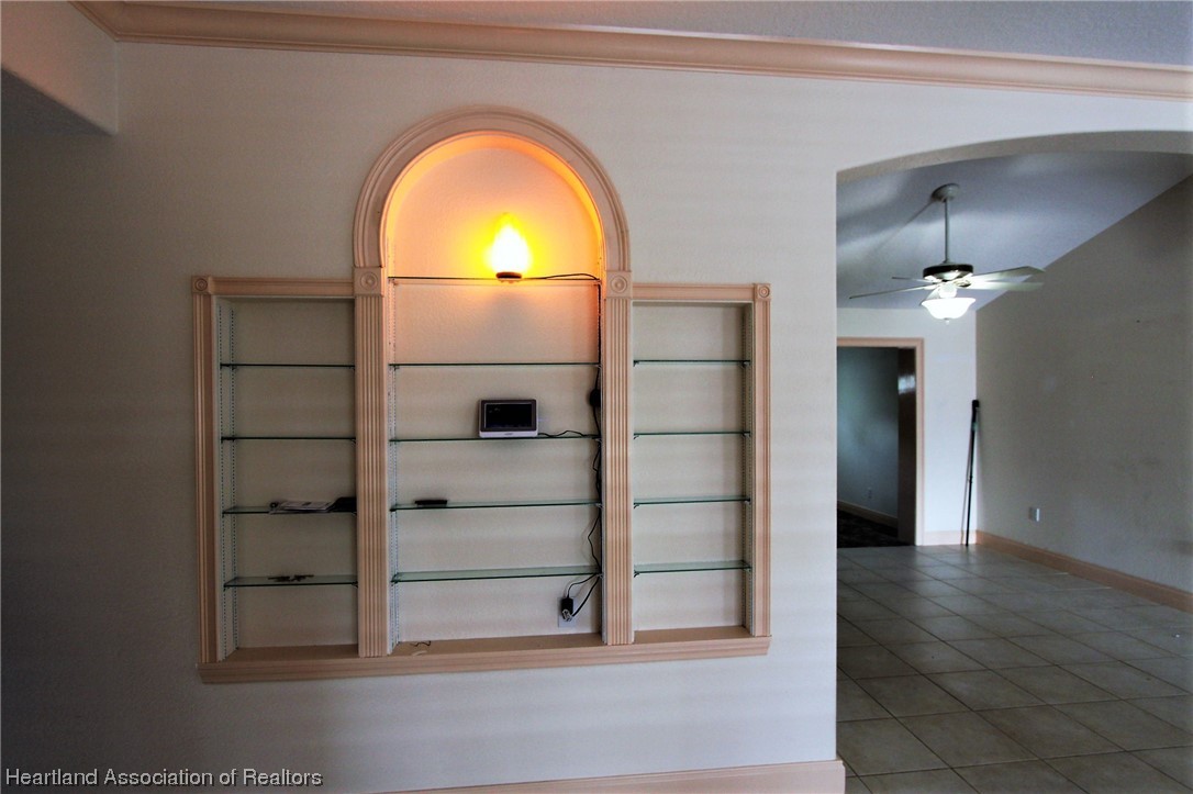 20 Quail Roost Road Lake Placid, FL 33852 - Photo 23 of 28 a view of a livingroom with wooden floor and windows