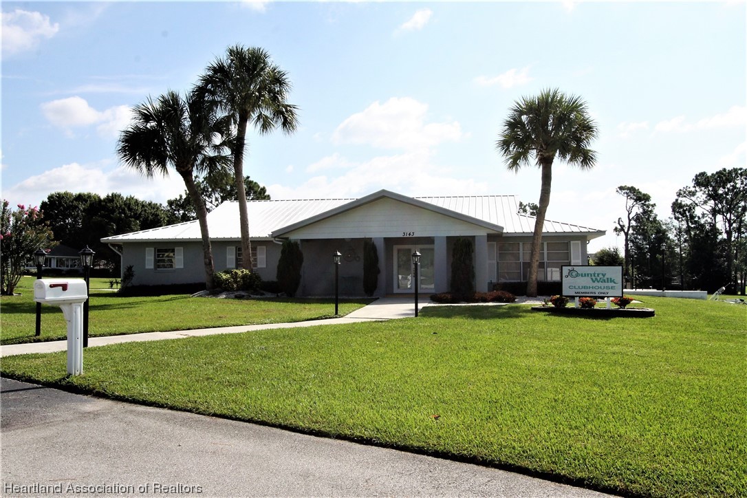 20 Quail Roost Road Lake Placid, FL 33852 - Photo 27 of 28 a swimming pool with wooden fence