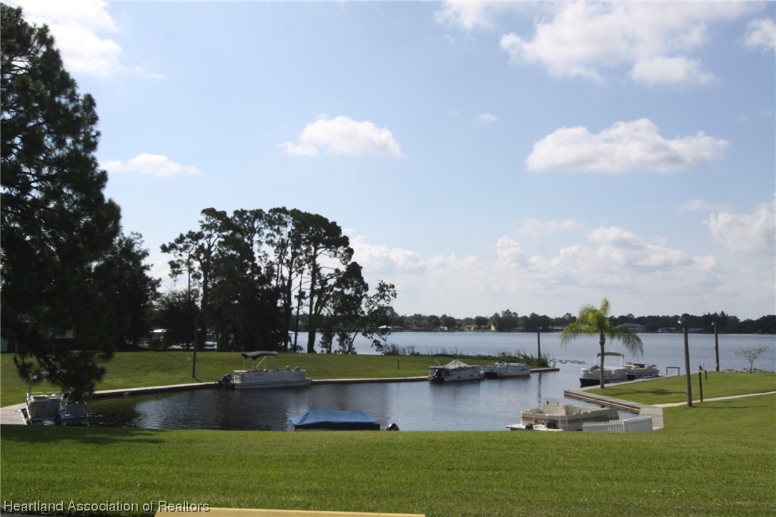 20 Quail Roost Road Lake Placid, FL 33852 - Photo 28 of 28 a view of a lake with houses in back