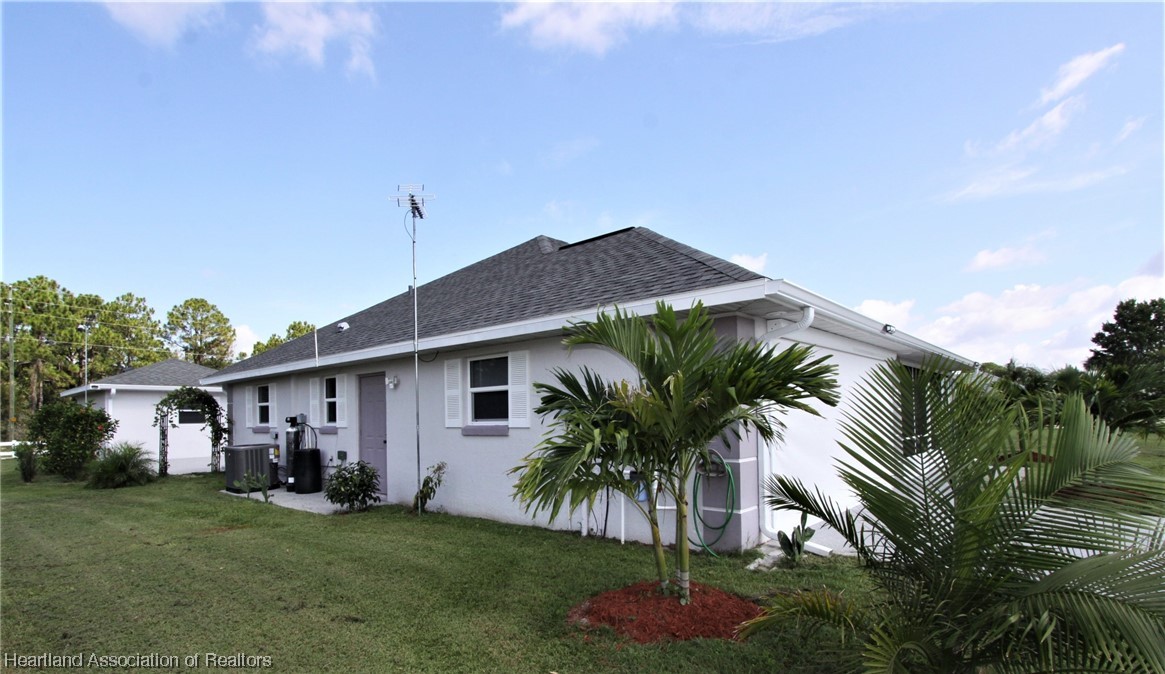 20 Quail Roost Road Lake Placid, FL 33852 - Photo 10 of 28 a front view of house with yard and green space