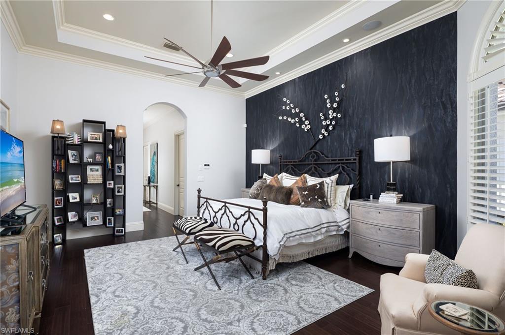 4610 Via Cappello Estero, FL 34134 - Photo 22 of 50 a bedroom with double bed and a window