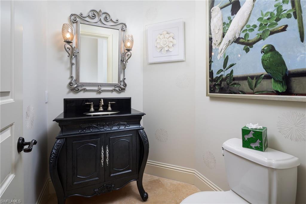 4610 Via Cappello Estero, FL 34134 - Photo 26 of 50 a view of a hallway with washer and dryer
