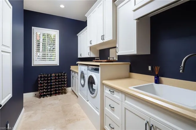 a kitchen with a sink stove and microwave