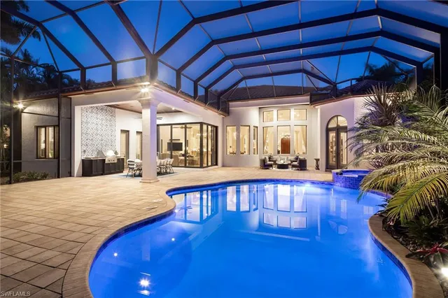 a view of a living room with a swimming pool