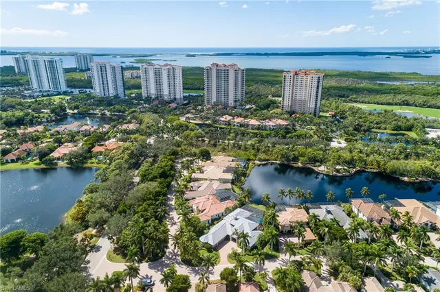 a view of a backyard with sitting area