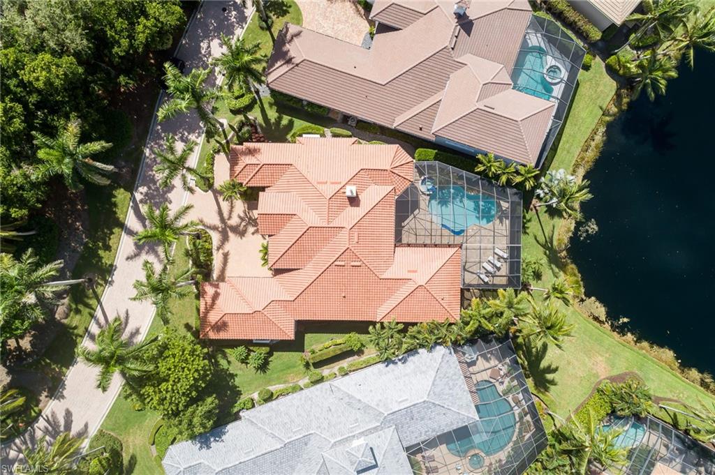 4610 Via Cappello Estero, FL 34134 - Photo 47 of 50 an aerial view of a house with a yard