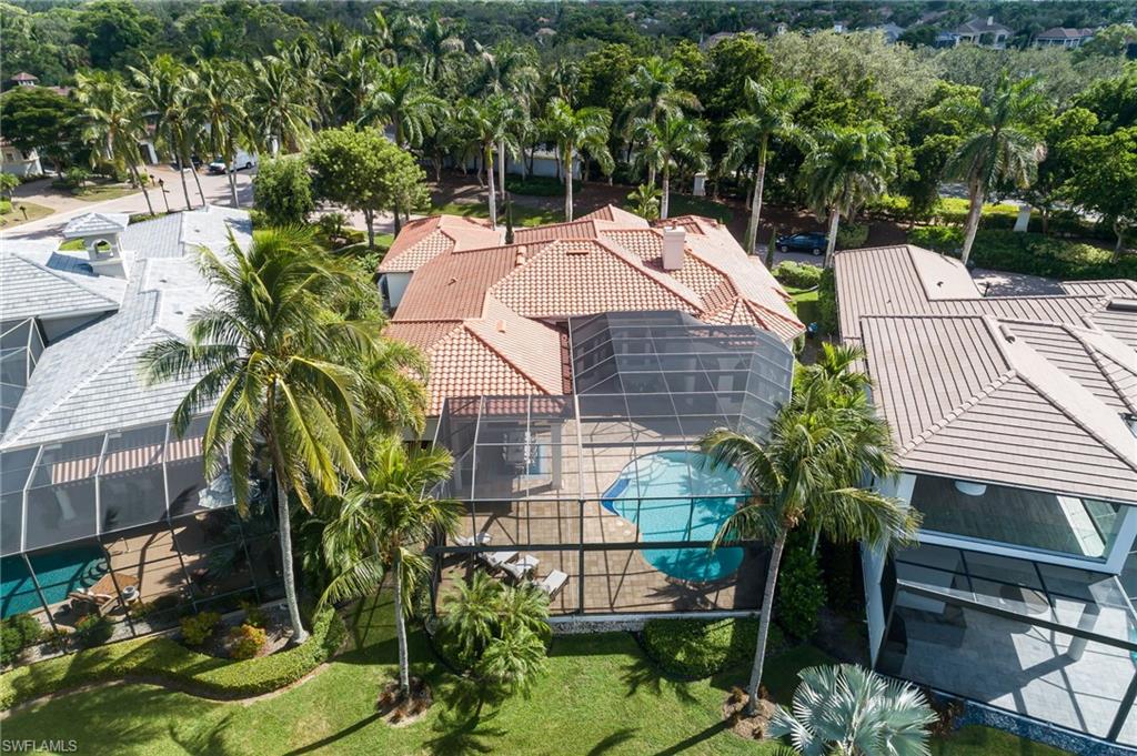 4610 Via Cappello Estero, FL 34134 - Photo 48 of 50 a view of a backyard with sitting area