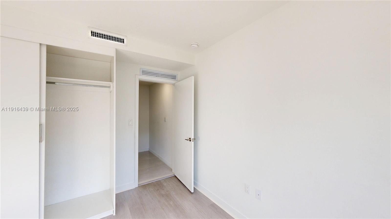 14546 Southwest 260th Street, Unit 14546 Homestead, FL 33032 - Photo 14 of 31 a view of a hallway