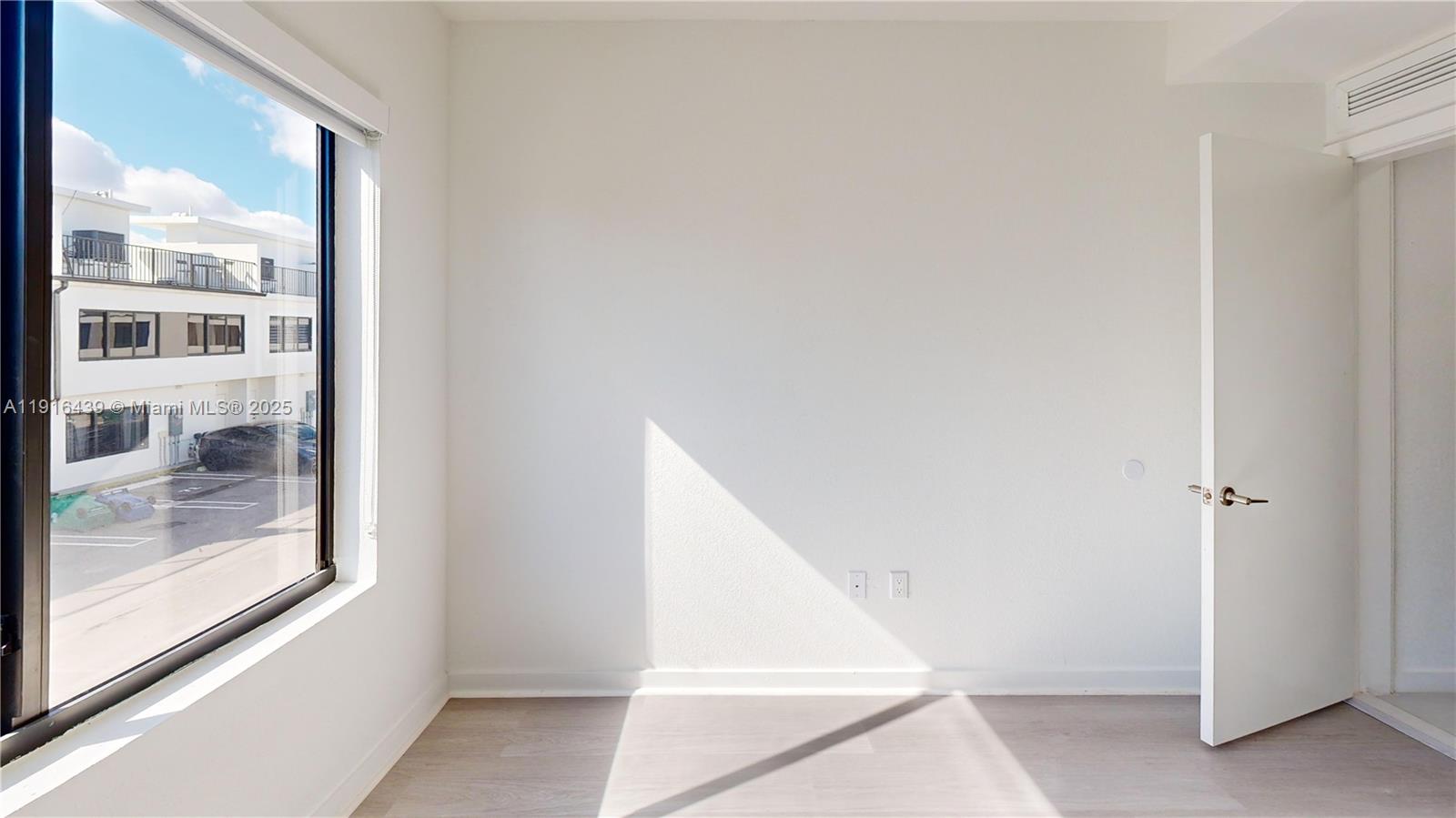 14546 Southwest 260th Street, Unit 14546 Homestead, FL 33032 - Photo 24 of 31 a view of staircase with open door