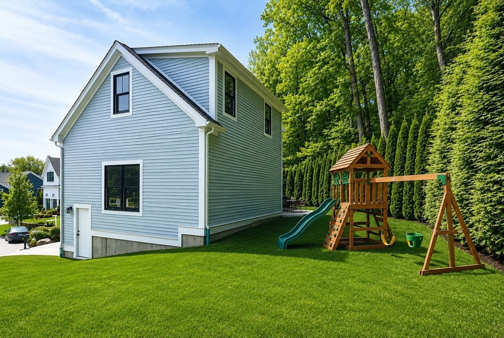 17 Sunrise Terrace Needham, MA 02492 - Photo 40 of 42 a house that has a backyard