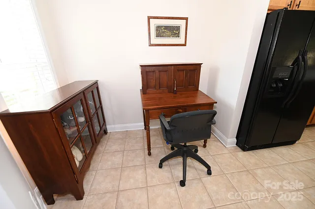 a kitchen with stainless steel appliances a refrigerator a sink a stove top oven and a refrigerator