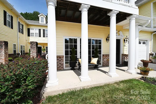 a view of a pathway with house and front view of a house