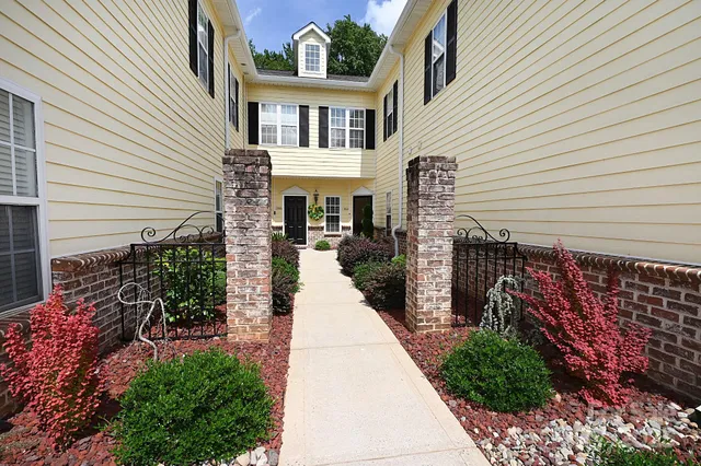 a view of a house with a big yard