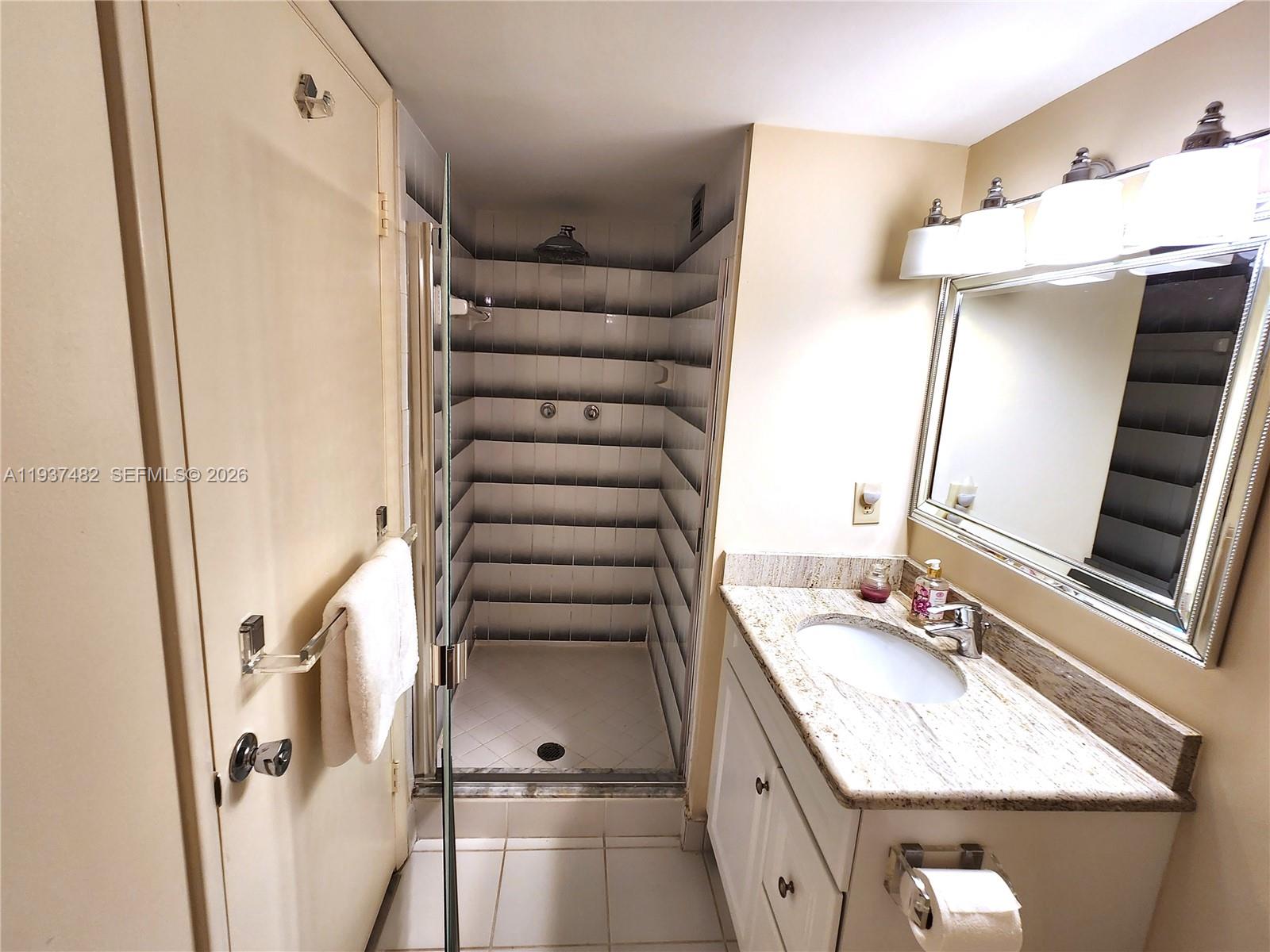 1631 Riverview Road, Unit 203 Deerfield Beach, FL 33441 - Photo 15 of 33 Hall Bathroom