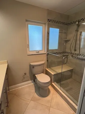 a bathroom with a toilet and a sink