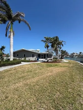 a view of a house with a swimming pool