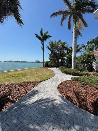 a view of a backyard with a patio