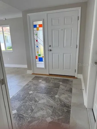 an empty room with windows