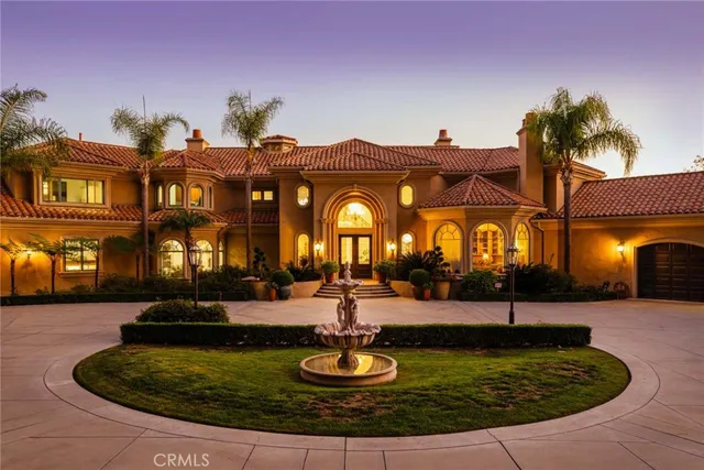 a outdoor space with patio lots of furniture and chandelier