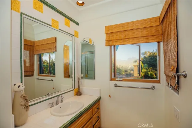 a front view of a house with parking space