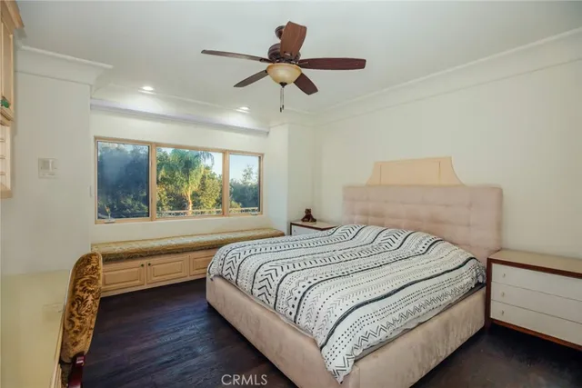 a view of a livingroom with furniture and a window