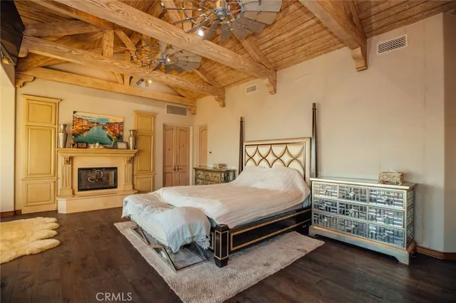 a view of entryway livingroom and hall with wooden floor