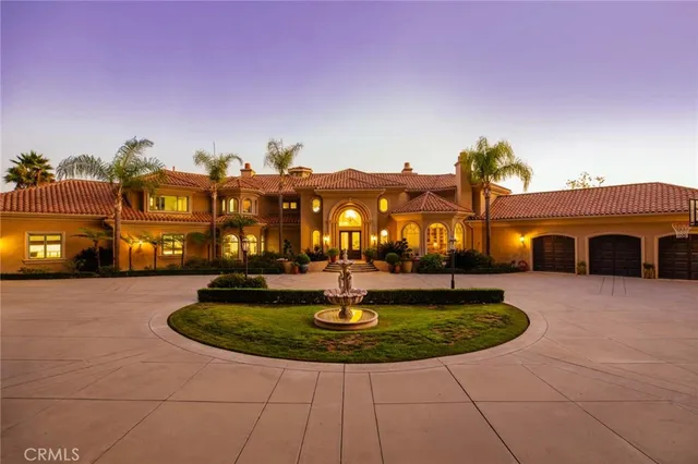 a outdoor space with patio lots of furniture and chandelier