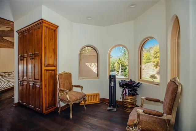 a kitchen with a sink refrigerator and microwave