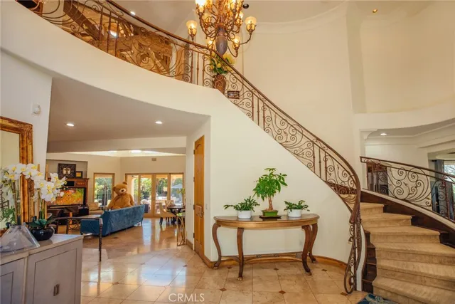 a living room with furniture a rug and a fireplace