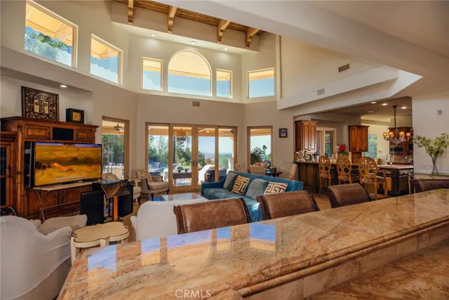 a view of a balcony with chairs