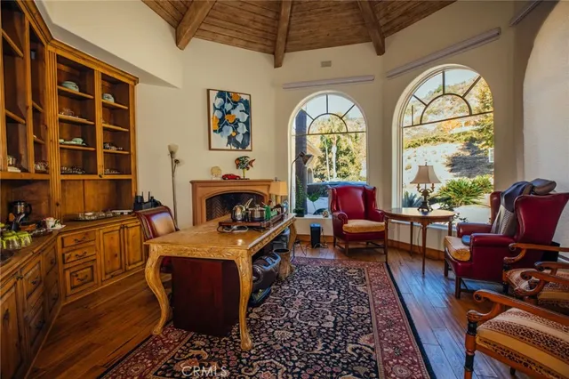 a front view of house with a garden