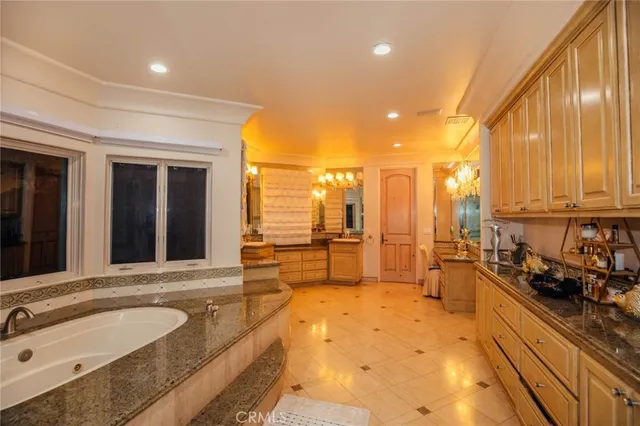 an aerial view of a house with a yard and garden