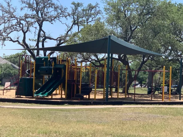 a view of a swimming pool with an outdoor seating