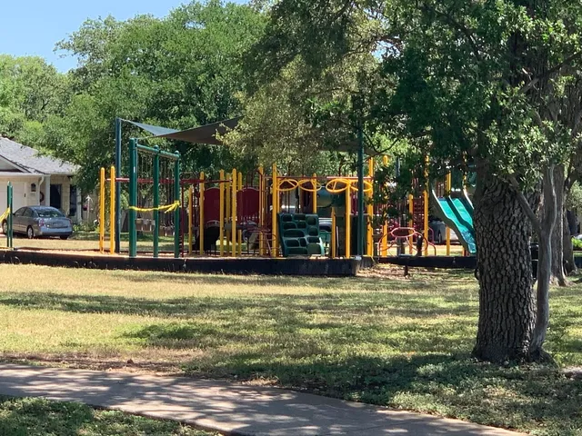 a view of a swimming pool and a big yard